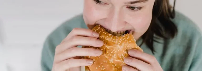 Woman eating burger