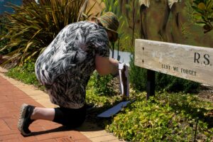 Older women bending down to do gardening